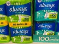 Closeup of bags with always ultra women sanitary towels in shelf of german supermarket