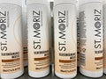 Closeup of bottles St. Moriz self tanning mousse in shelf of german supermarket