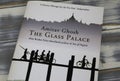 Closeup of isolated book cover of indian writer Amitav Gosh, the glass palace