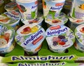 Closeup of isolated Ehrmann Almighurt yoghurt cups in cooling shelf