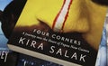 Closeup of isolated national geographic book cover of Kira Salak Four corners Papua new Guinea adventure