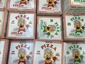View on carton boxes with gangstarella capi team pizza in freezer of german supermarket