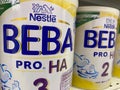 View on isolated can nestle beba baby food in shelf of german supermarket