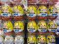 View on stacked kinder surprise eggs in shelf of german supermarket