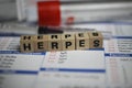 Closeup of word herpes on laboratory requisition slip with syringe and vial