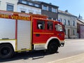 View on red german firefighter truck on streets of city