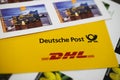 Close up of Deutsche Post and DHL logo with stamps focus on center Royalty Free Stock Photo