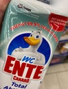 Closeup of bottle toilet cleaner with johnson wc ente logo lettering in shelf of german supermarket