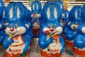 Closeup of group many blue kinder chocolate easter bunnies in shelf of german supermarket