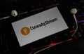 Closeup of smartphone screen with logo lettering of online tv and movie streaming service curiositystream on illuminated computer