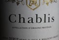 Makro closeup of isolated white wine bottle label with word text chablis Royalty Free Stock Photo