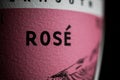 Makro closeup of isolated wine bottle label with word rose