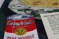 Close up of Campbells noodle soup can advertising in vintage magazine from the sixties