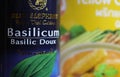 Close up of can thai basilicum with blurred yellow curry box Background