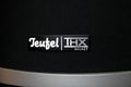 Viersen, Germany - May 9. 2020: Close up of isolated logo lettering of german audio equipment manufacturer Teufel on thx