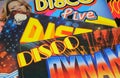 Close up of isolated retro vinyl record covers with disco music compilation from seventies