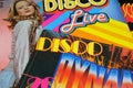 Close up of isolated retro vinyl record covers with disco music compilation from seventies