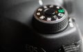 Close up of mode dial of old digital camera Canon EOS 50 D Royalty Free Stock Photo