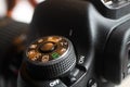 Close up of mode dial of old digital camera Canon EOS 50 D Royalty Free Stock Photo