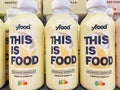 Closeup of bottles Yfood vanilla drinking meal in shelf of german supermarket