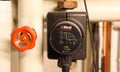 Closeup of isolated biral  controller panel of circulation pump for heating system Royalty Free Stock Photo