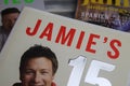 Closeup of isolated Jamie Oliver cooking books on table