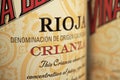 Closeup of Rioja red wine crianza bottle label with spanish designation of origin D.O.C. and aging designation for quality wines