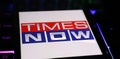 Smartphone with logo lettering of indian news channel Times Now on computer keyboard