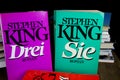 View on covers of Stephen King novels with pile of books background Royalty Free Stock Photo