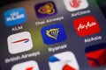 View on variety of international airline booking apps with focus on blue Ryanair logo in center
