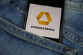 Close up of isolated mobile phone with Commerzbank logo lettering in jeans pocket
