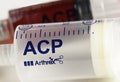 Closeup of Arthrex ACP double syringe for production of autologous platelet rich plasma, PRP, from own blood