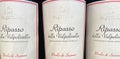 Closeup of italian Corte Figaretto Ripasso della Valpolicella wine bottles