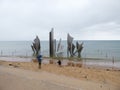 Vierville-sur-Mer, Omaha Beach, France - AUGUST 7, 2019: Memorial of heroic assault of US V Corps on D-Day landing beach Omaha in Royalty Free Stock Photo