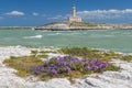 Vieste Lighthouse also Isola Santa Eufemia, active lighthouse on the islet of Santa Eufemia, located between the rocks of Santa Royalty Free Stock Photo