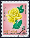 VIETNAM - CIRCA 1968: A stamp printed in North Vietnam from the `Flowers` issue shows a yellow rose, circa 1968.