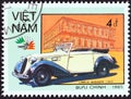 VIETNAM - CIRCA 1985: A stamp printed in North Vietnam shows Lancia Augusta, 1934, circa 1985.