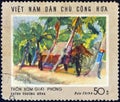 VIETNAM - CIRCA 1969: A stamp printed in North Vietnam shows Liberated Hamlet painting by Huynh Phuong Dong, circa 1969.