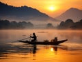 vietnam fishermen on the boat go out to fish at sunset Royalty Free Stock Photo