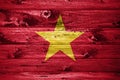 Vietnam flag on wooden planks background