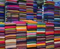 Piles of fabric for sale at covered market Hanoi Vietnam Royalty Free Stock Photo