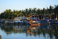 Vietnam - Hoi An- Destination scenic of larger fishing boats on the Thu Bon River at sunset