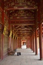 Red and gold corridor at the Imperial Purple Forbidden city Hue Vietnam 