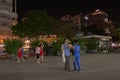 Vietnam; Jan 2020: People dancing at the September 23rd Park in the middle of Saigon at night. Couple taking ballroom dances