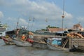 A line of boats selling squash and pumpkins at Floating Market Cai Rang, Vietnam 