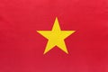 Vietnam national fabric flag with emblem, textile background