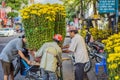 Vietnam, Nha Trang, January 23, 2020: Vietnamese men prepare to transport flowers for the Lunar New Year, Tet