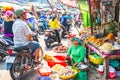 Vietnam, Phu Quoc Island, 26 February 2018: Unidentified women with typical vietnamese conical hats sell fresh food on a