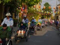 Vietnam, Quang Nam Province, Hoi An City, Old City listed at World Heritage site by Unesco, Toursits and Cyclo Drivers