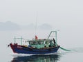 Vietnam, Quang Ninh Area, Halong Bay or Ha Long Bay Unesco World Heritage Site, Fishing Boa